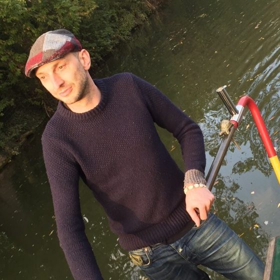 Mark Kindred on the back of his narrowboat